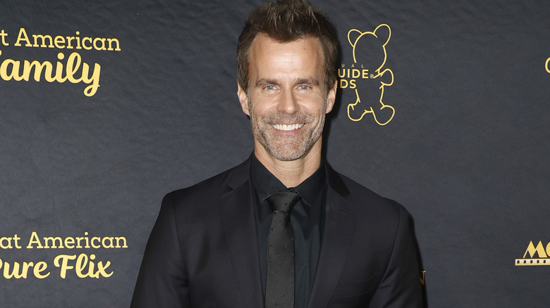 Cameron Mathison posing