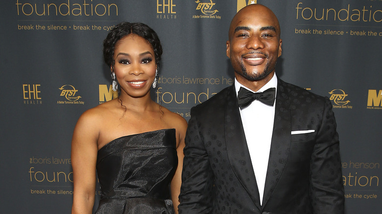 Charlamagne and his wife pose together