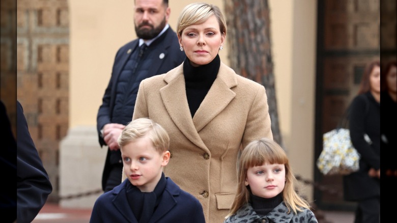 Princess Charlene walking with twins