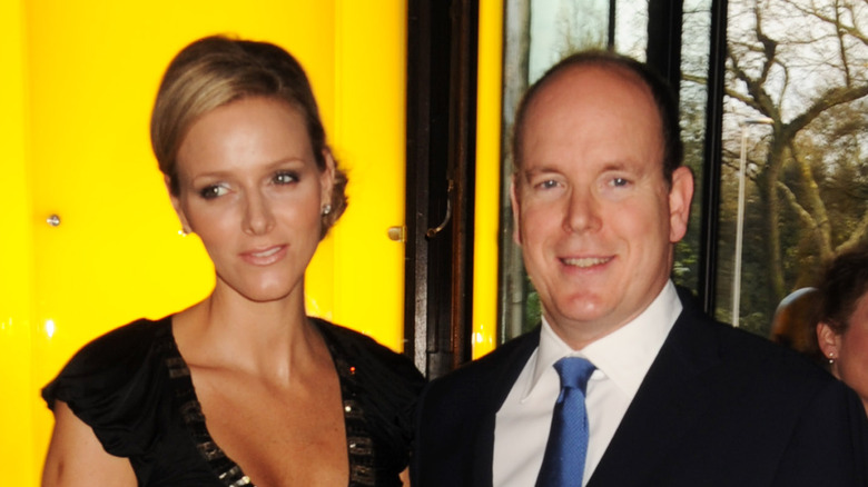 Princess Charlene and Prince Albert smiling