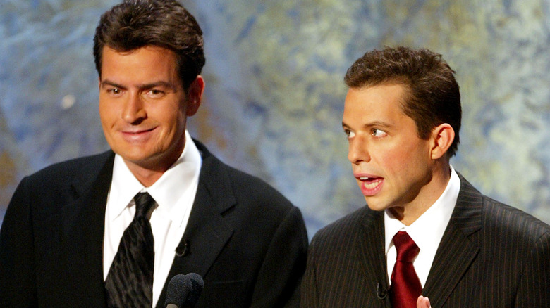 Charlie Sheen and Jon Cryer wearing suits