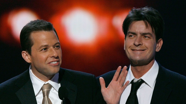 Jon Cryer and Charlie Sheen accepting an award