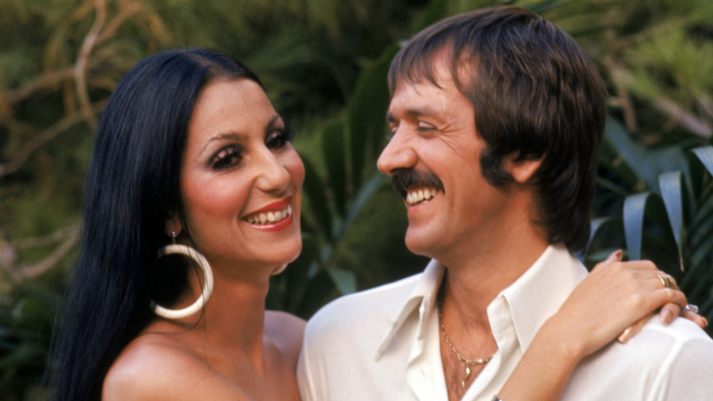 Cher smiling at Sonny Bono