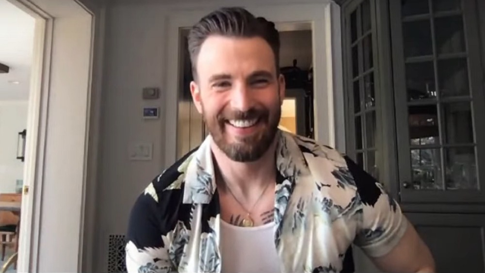 Chris Evans with tattoos showing