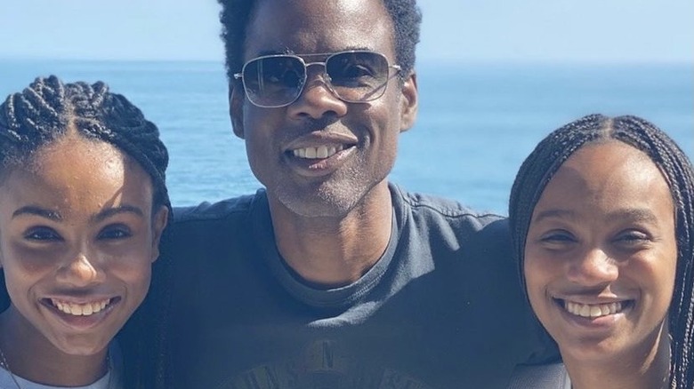 Chris Rock poses with his daughters