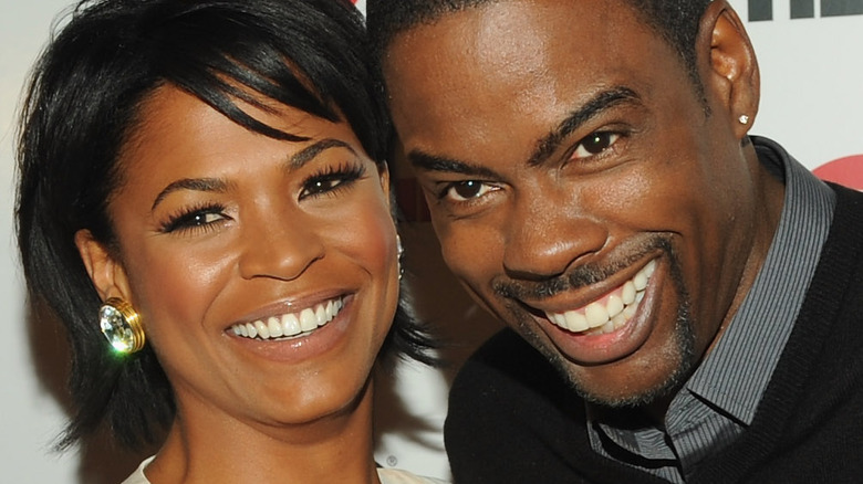 Chris Rock and Nia Long posing