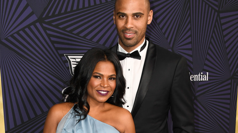 Nia Long and Ime Udoka posing