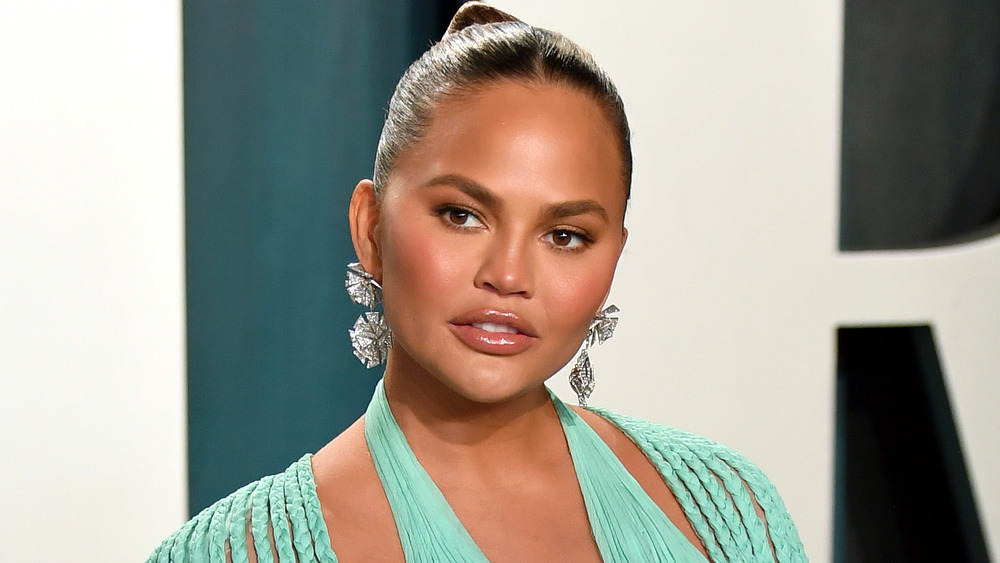 Chrissy Teigen staring