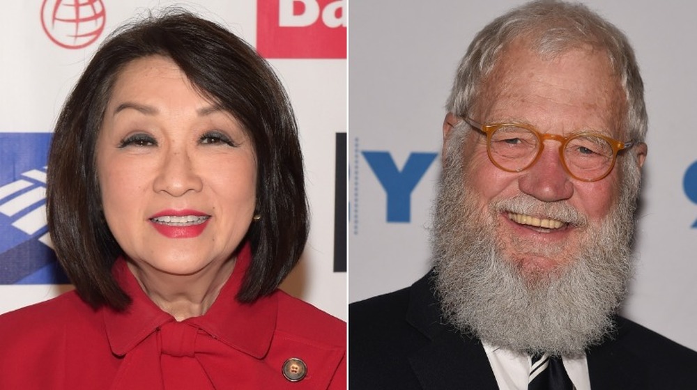 Connie Chung smiling; David Letterman smiling 