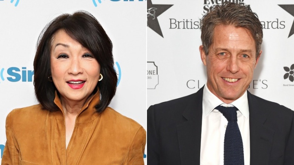 Connie Chung smiling; Hugh Grant smiling