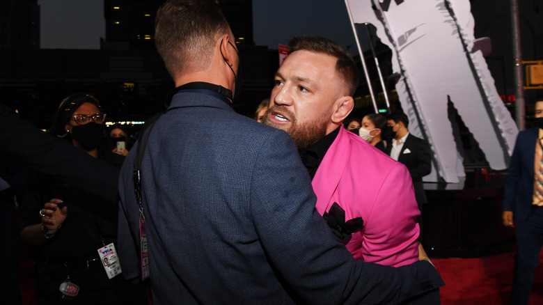 Conor McGregor being detained by security at the 2021 VMAs