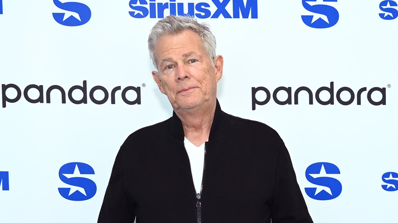 David Foster wearing black jacket