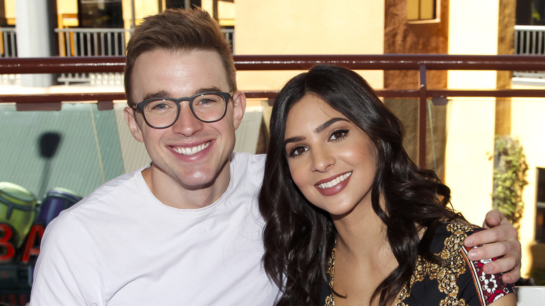 Chandler Massey and Camila Banus smiling