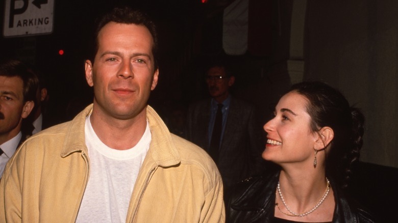 Demi Moore looking at Bruce Willis