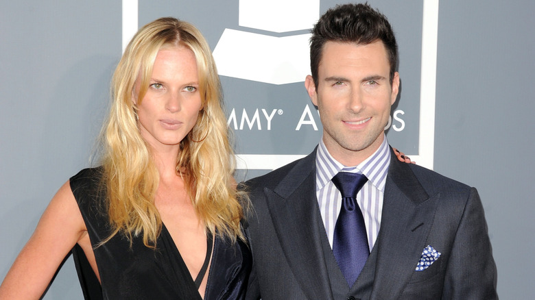 Adam Levine and Anne V smiling