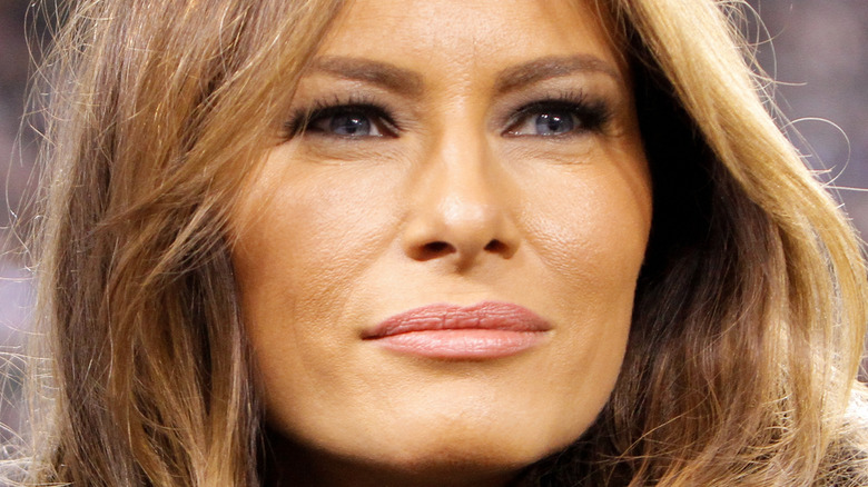 Melania Trump somewhat smiling