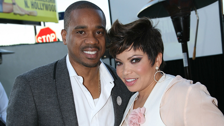 Duane Martin and Tisha Martin pose together