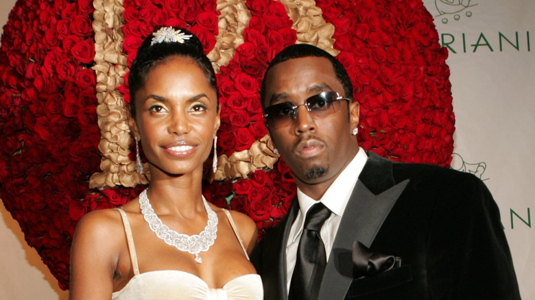 Kim Porter and Diddy posing