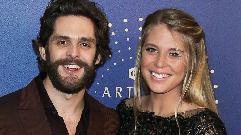 Thomas Rhett and wife Lauren Akins on red carpet