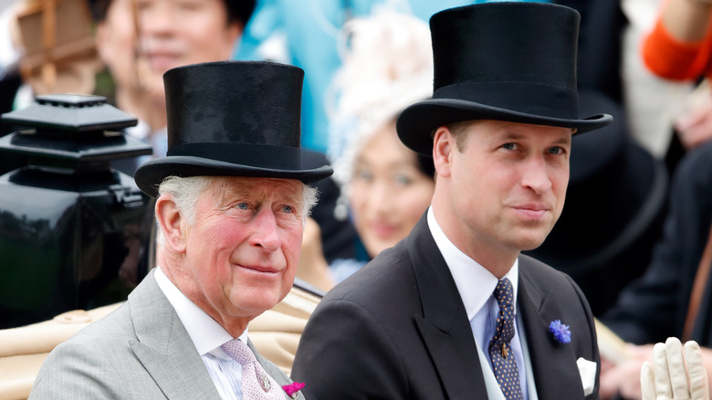 Prince Charles and Prince William wearing tophats