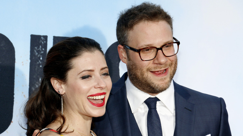 Lauren Miller and Seth Rogen posing smiling