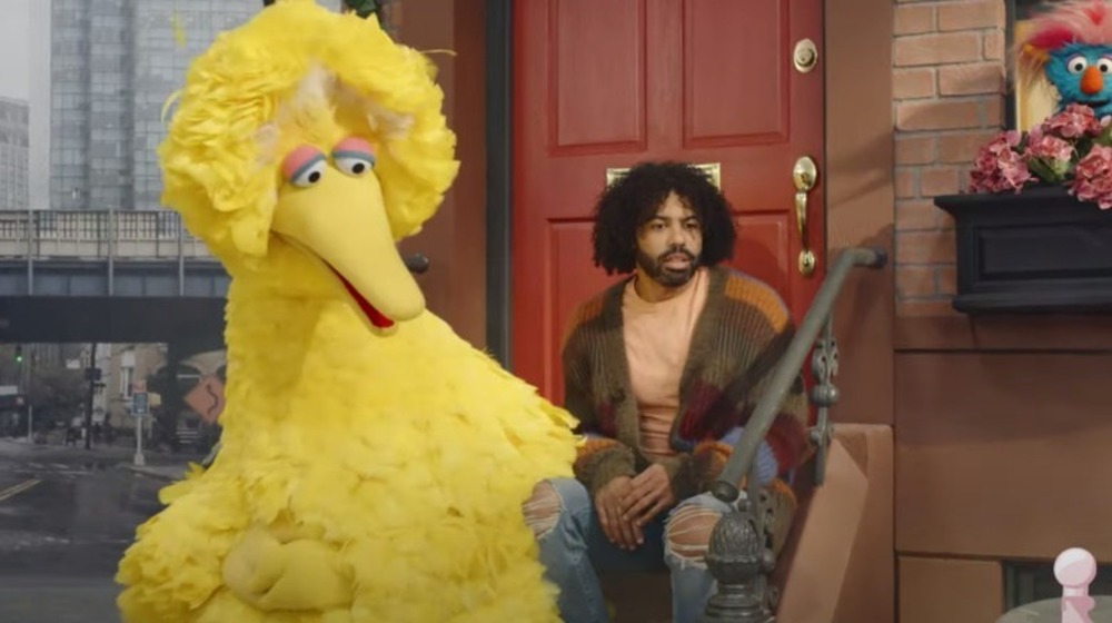 Big Bird and Daveed Diggs looking serious in Sesame Street commercial