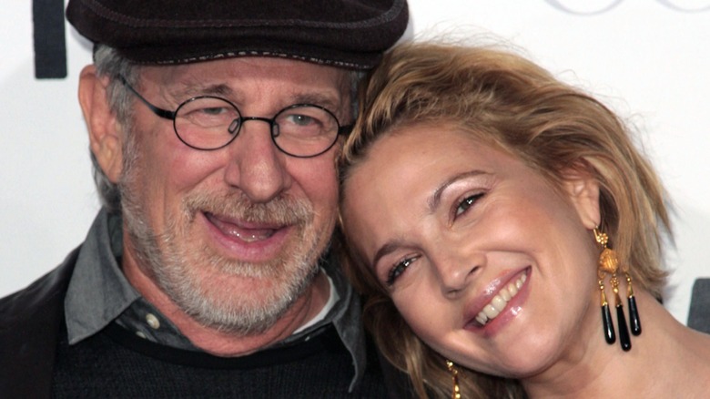 Drew Barrymore and Steven Spielberg smiling