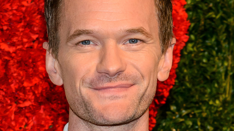 Neil Patrick Harris smiling on red carpet