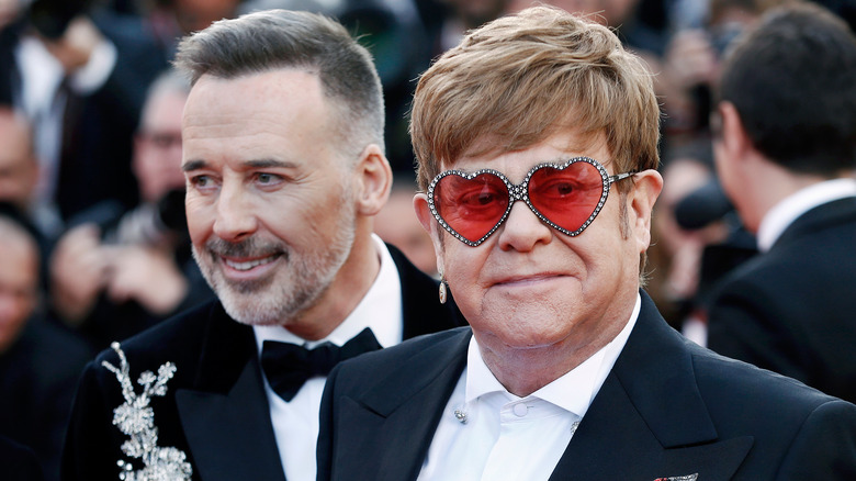 Elton John and David Furnish smiling