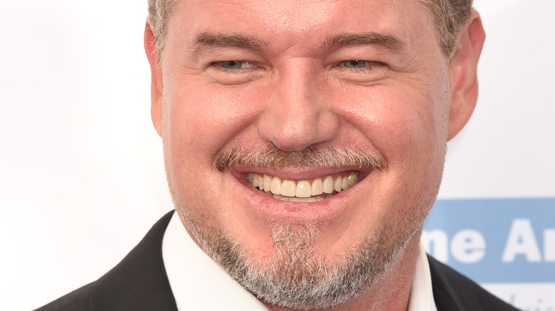 Eric Dane smiles on the red carpet