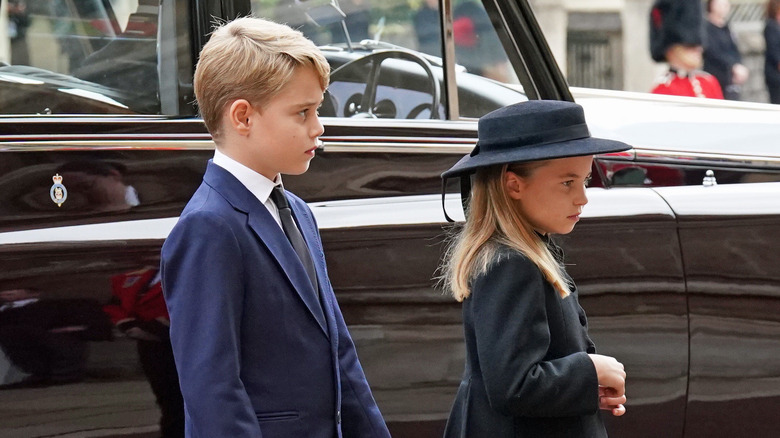 Prince George and Princess Charlotte standing