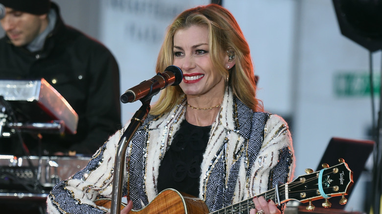 Faith Hill wears sequin printed cardigan while performing