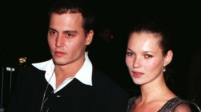 Kate Moss, Johnny Depp posing