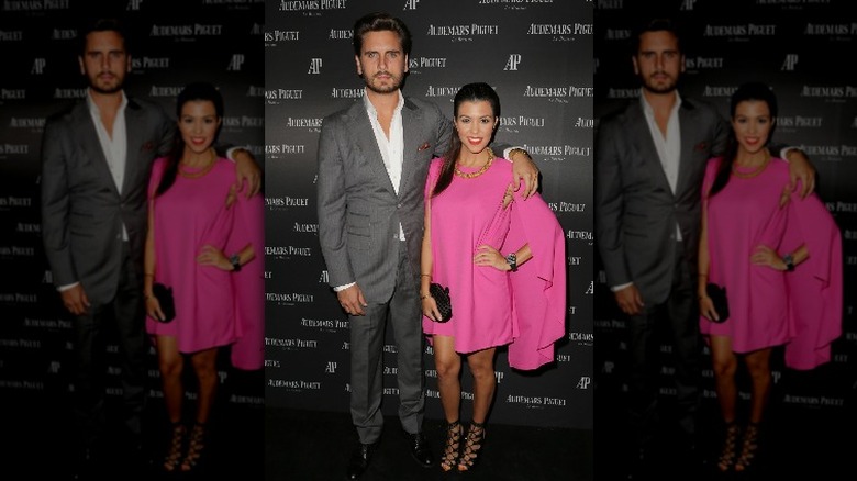 Scott Disick and Kourtney Kardashian posing