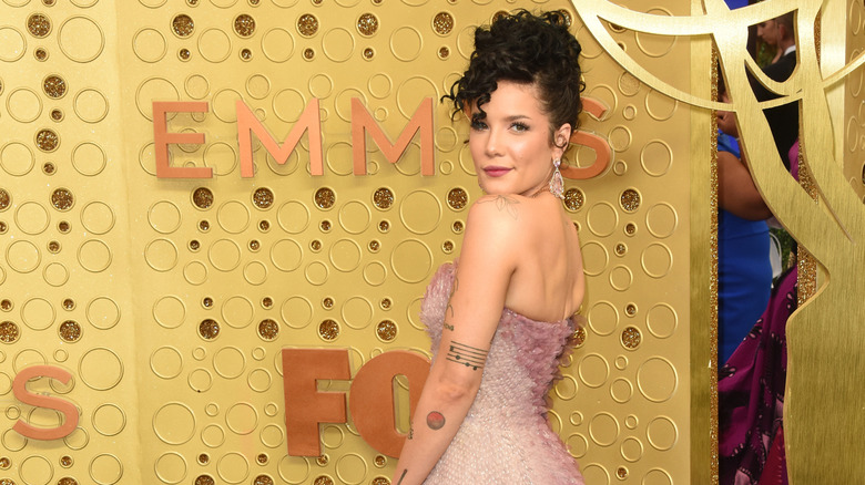 Halsey posing on the red carpet