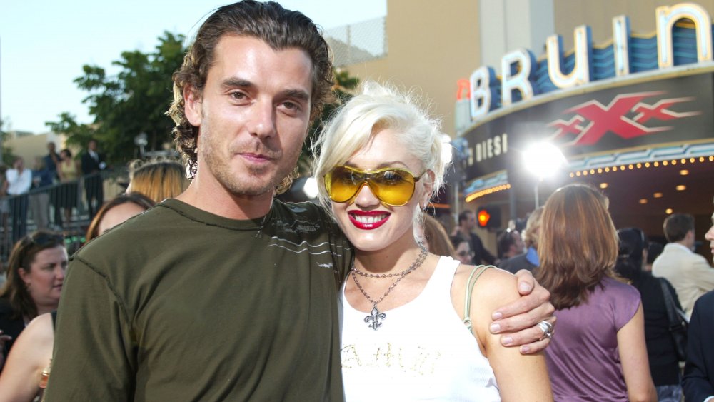 Gavin Rossdale and Gwen Stefani, both dressed casually, attending a movie premiere the year they got married