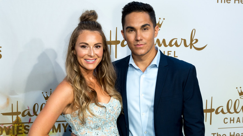 Alexa and Carlos PenaVega posing