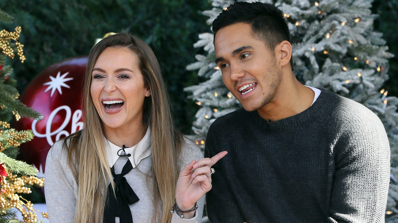 Alexa PenaVega pointing at Carlos PenaVega