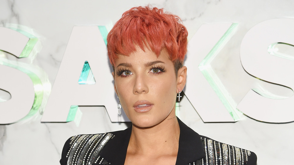 Halsey with a serious expression