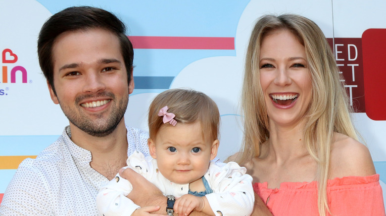 Nathan Kress and London Elise Moore with their daughter Rosie 