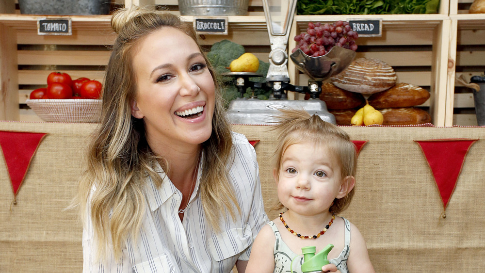 Haylie Duff, laughing next to her daughter 