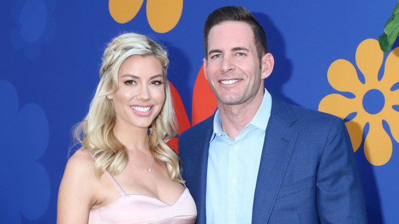 Heather Rae Young and Tarek El Moussa smiling