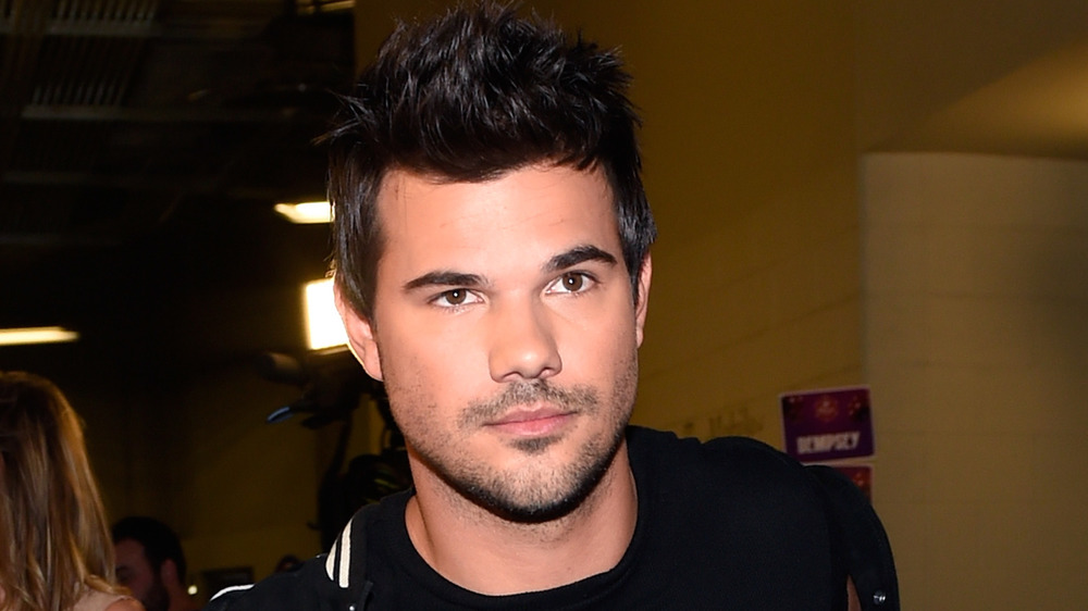 Taylor Lautner looking serious