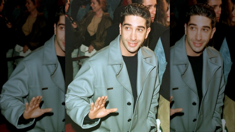 David Schwimmer smiling and waving