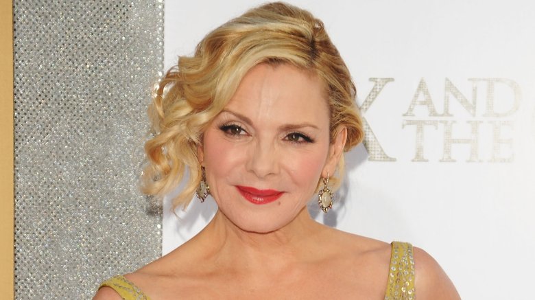 Kim Cattrall smirking