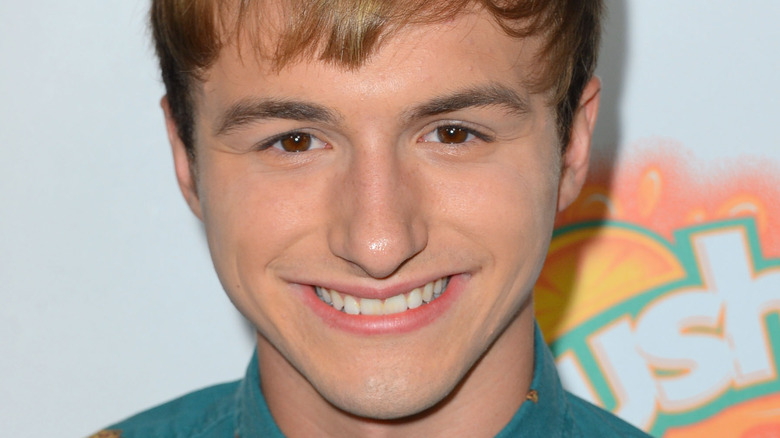 Lucas Cruikshank smiling at the premier of Fun Size