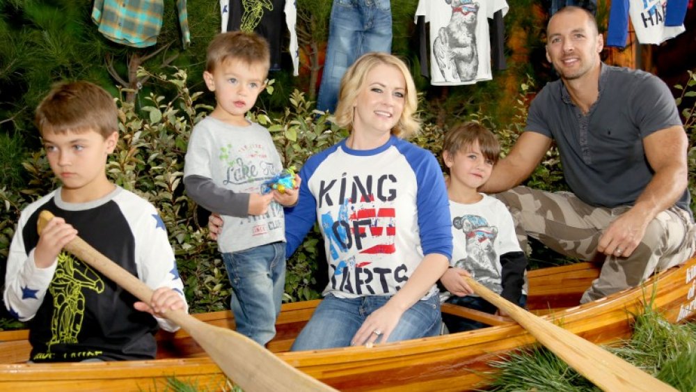 Melissa Joan Hart with her family in a canoe 
