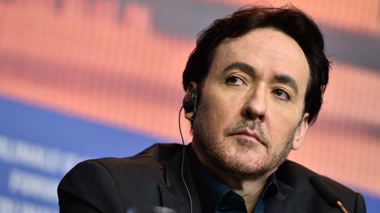 John Cusack on black jacket