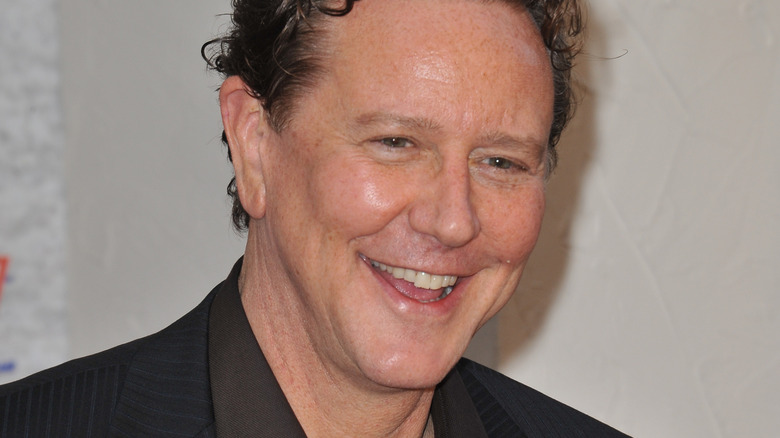 Judge Reinhold in black jacket