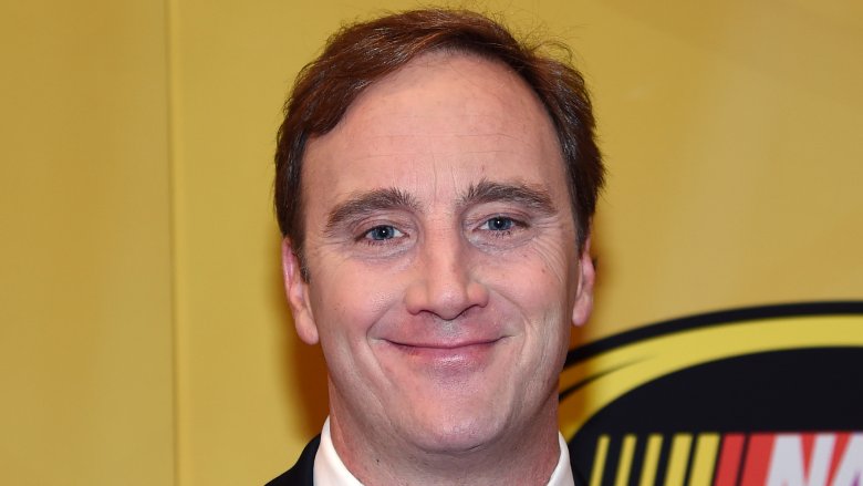 Jay Mohr smiling in suit